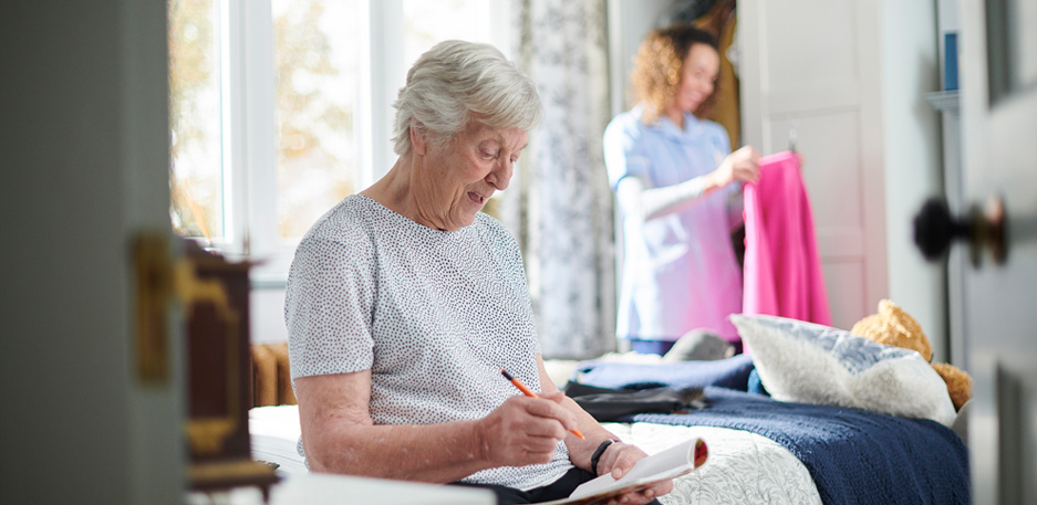 female resident doing crossword