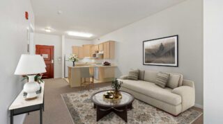 Regent at Burnsville Care Suites, view of living room, bedroom, kitchen, entry and bath.